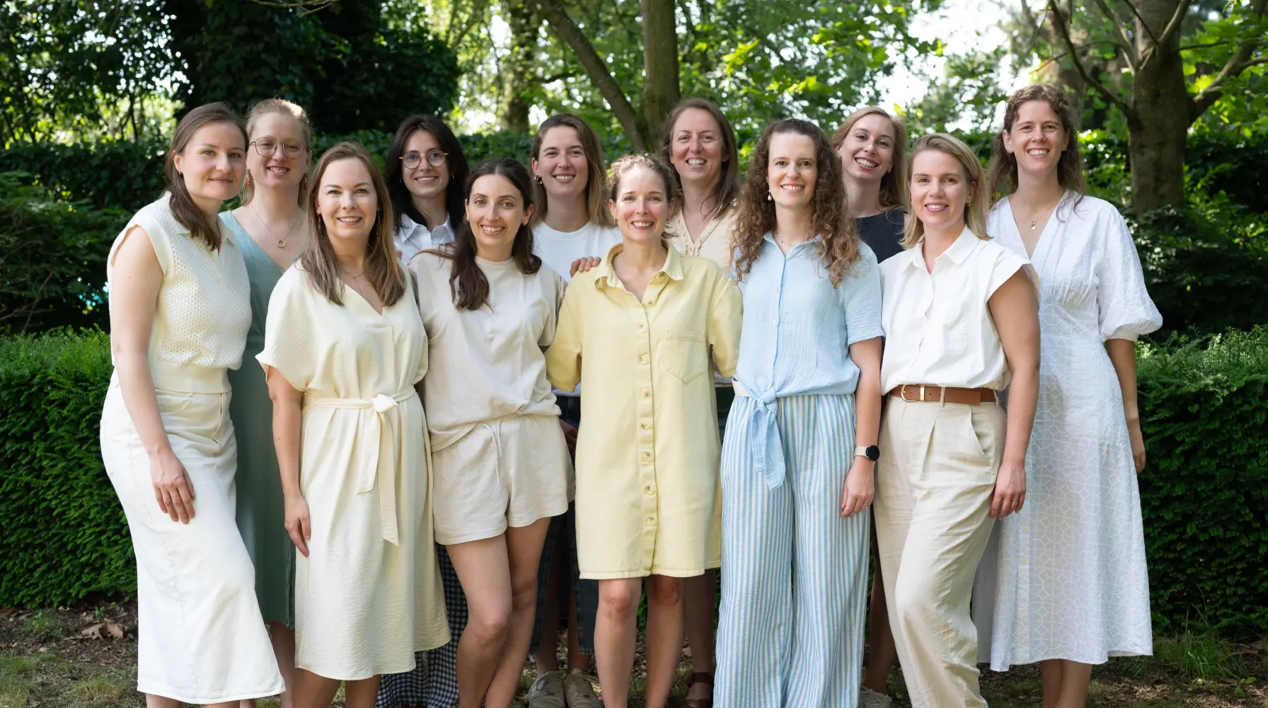 Groepsfoto van het team van de praktijk